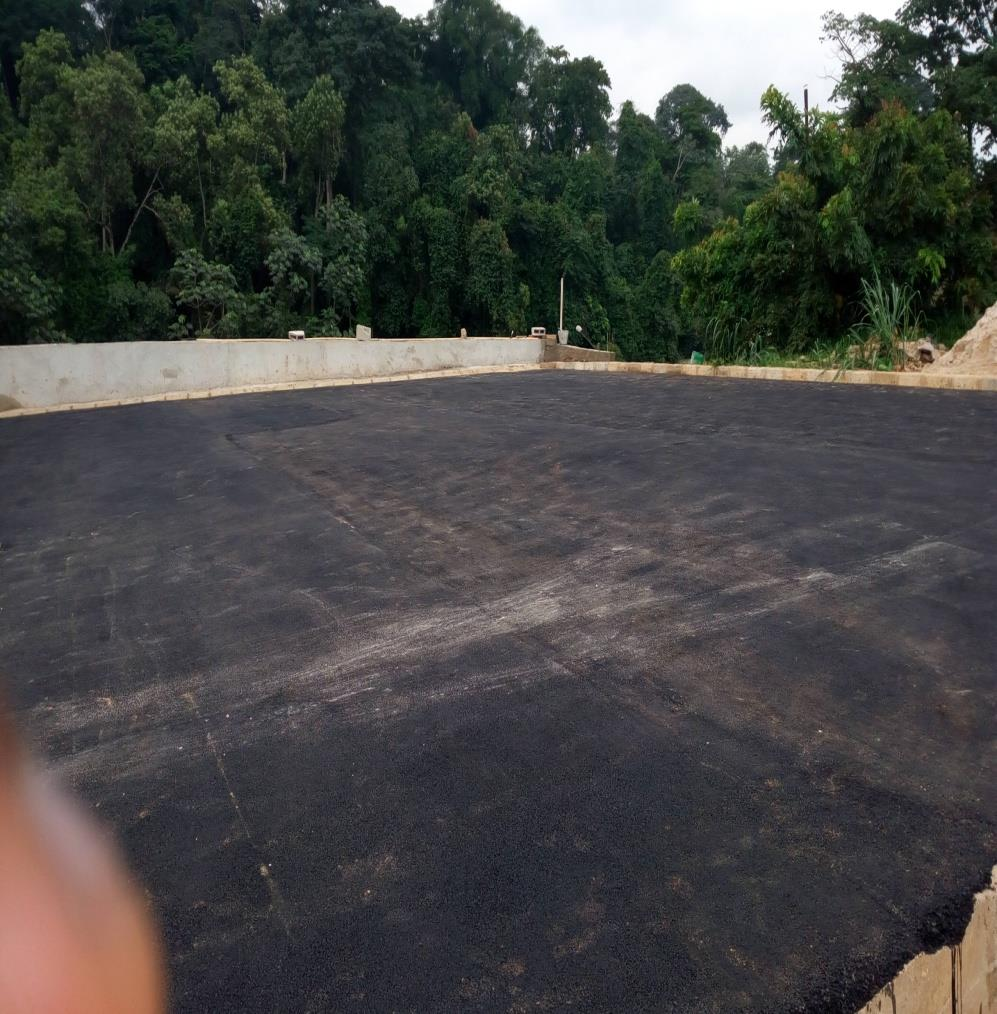 Mur de soutènement et parking à HMA